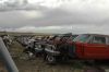 A row of 60's Ford Comets and Falcons for parts