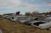 A row of full size 60's Chevrolet's for parts
