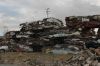 A wall of crushed cars