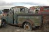 an old truck waiting to be restored, do you know what it is?