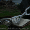 a mangled 64 impala grill