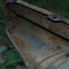 rusty end of 64 Impala filler panel